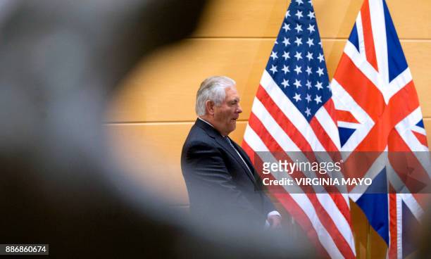 Secretary of State Rex Tillerson waits for the arrival of British Foreign Secretary prior to a bilateral meeting on the sidelines of a NATO foreign...