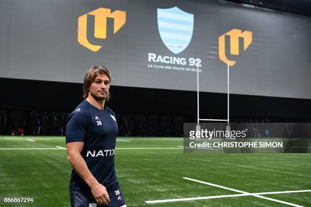 Racing 92's hooker Dimitri Szarzewski arrives for a training session at the club's stadium U Arena equiped with a synthetic field, on December 6,...