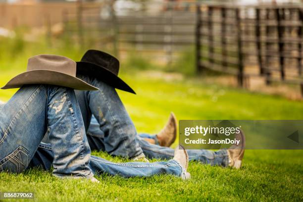 cowboys relaxing - cowboy sleeping stock pictures, royalty-free photos & images