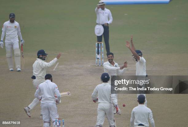 Ravindra Jadeja of India celebrates the wicket of Sri Lanka's Dimuth Karunaratne during the 4th day of 3rd test match between India and Sri Lanka at...