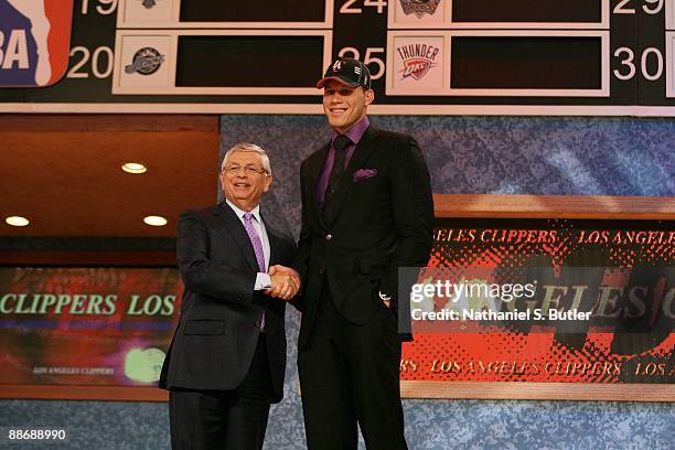 Blake Griffin shakes hands with NBA Commissioner David Stern after being selected first by the Los Angeles Clippers during the 2009 NBA Draft on June...