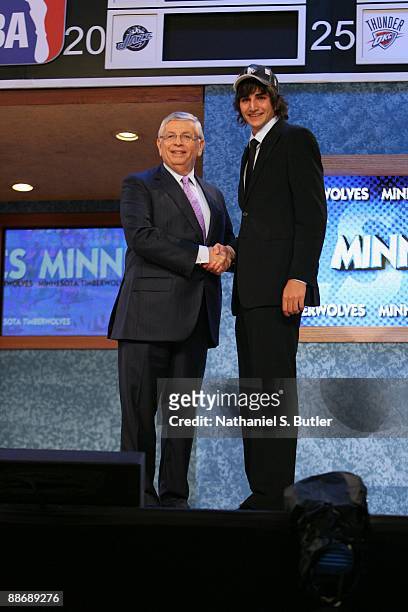 Ricky Rubio shakes hands with NBA Commissioner David Stern after being selected fifth by the Minnesota Timberwolves during the 2009 NBA Draft on June...