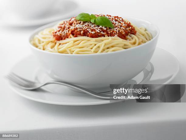 close up of spaghetti in bowl - bolognese sauce stock pictures, royalty-free photos & images