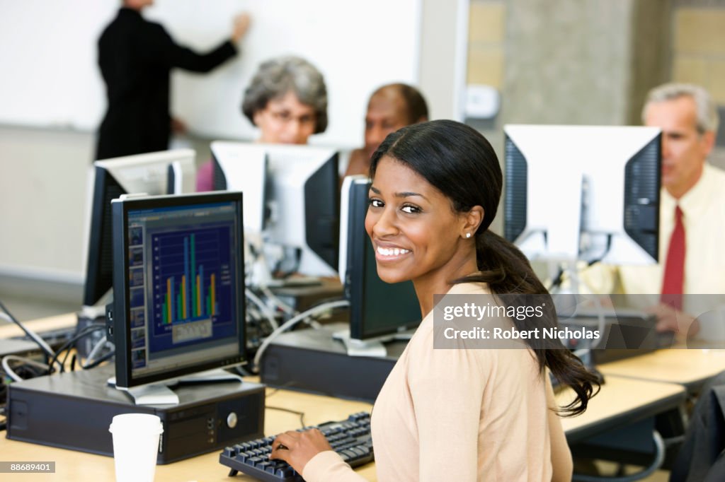 Person Using Computer Small Business Business People Working On Computers High-Res Stock Photo - Getty Images