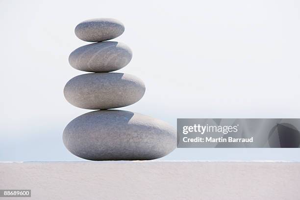Four Rocks Stacked Photos and Premium High Res Pictures - Getty Images