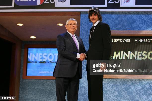 Ricky Rubio shakes hands with NBA Commissioner David Stern after being selected fifth by the Minnesota Timberwolves during the 2009 NBA Draft on June...