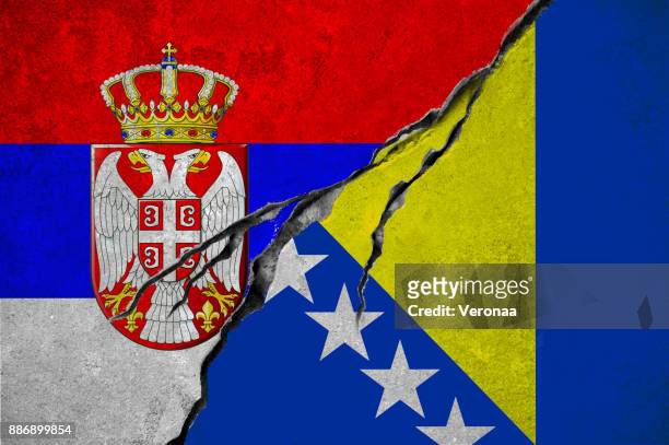 serbian and bosnia and herzegovina flag, conflict concept - serbian flag stock illustrations