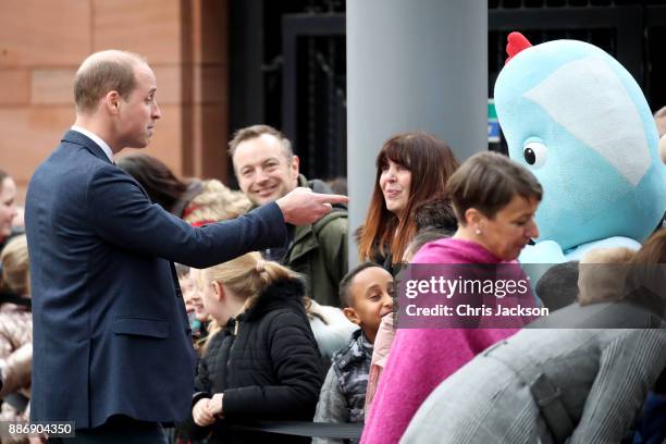 Prince William, Duke of Cambridge talks to children as he attends a 'Stepping Out' session at Media City on December 6, 2017 in Manchester, England....