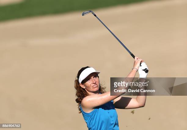 Florentyna Parker of England plays her second shot on the par 4, 14th hole during the first round of the 2017 Dubai Ladies Classic on the Majlis...