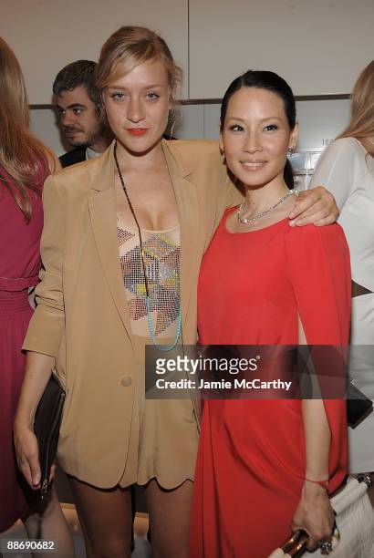 Chloe Sevigny and Lucy Liu attend the store opening at Swarovski Crystallized NYC Store on June 25, 2009 in New York City.
