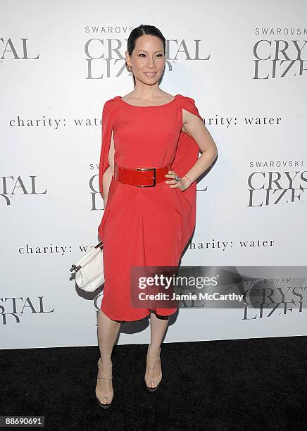 Lucy Liu attends the store opening at Swarovski Crystallized NYC Store on June 25, 2009 in New York City.