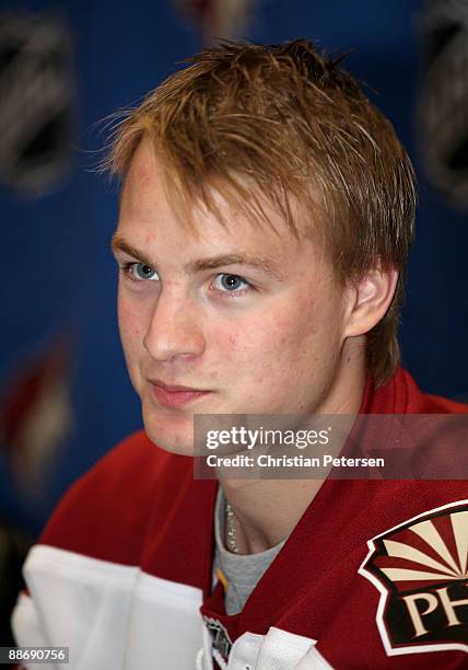 Mikkel Boedker of the Phoenix Coyotes signs autographs for fans during an open house at Jobing.com Arena on June 25, 2009 in Glendale, Arizona.