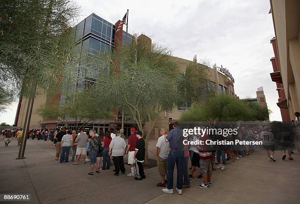 Fans of the Phoenix Coyotes line up outside of Jobing.com Arena during an open house on June 25, 2009 in Glendale, Arizona.