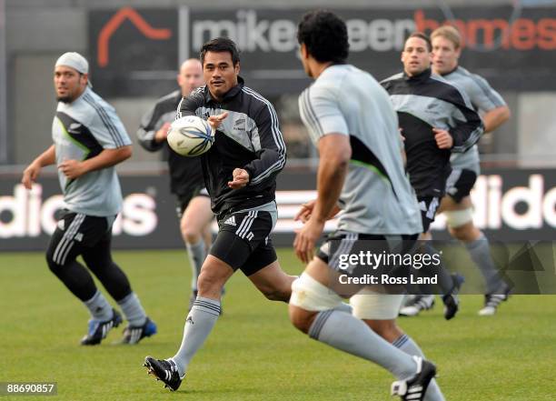 Isaia Toeava passes the ball during the All Black captains run at AMI Stadium on June 26, 2009 in Christchurch, New Zealand.