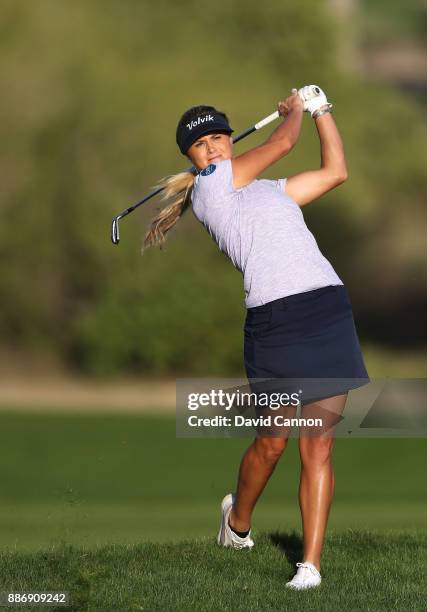 Carly Booth of Scotland plays her second shot on the par 4, 9th hole during the first round of the 2017 Dubai Ladies Classic on the Majlis Course at...