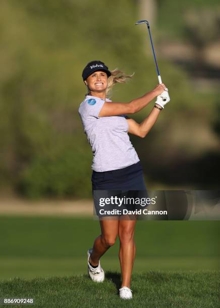 Carly Booth of Scotland plays her second shot on the par 4, 9th hole during the first round of the 2017 Dubai Ladies Classic on the Majlis Course at...