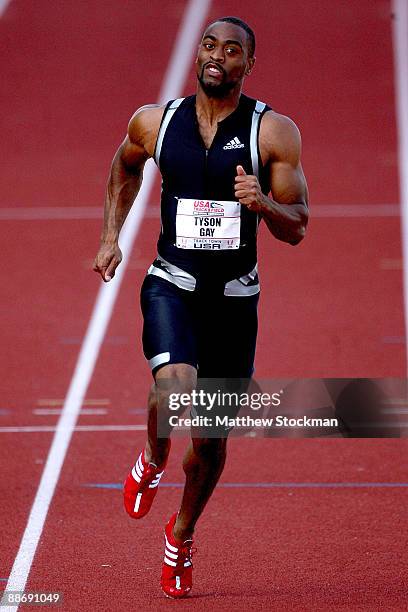 Tyson Gay competes in the first round of the 100 meter event during the USA Outdoor Track & Field Championships at Hayward Field on June 25, 2009 in...