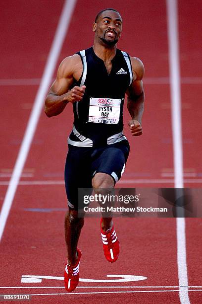 Tyson Gay competes in the first round of the 100 meter event during the USA Outdoor Track & Field Championships at Hayward Field on June 25, 2009 in...