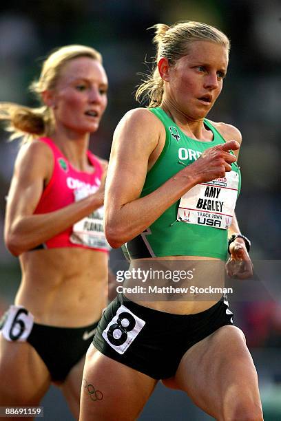 Amy Begley leads Shalane Flanagan in the 10,000 meter final during the USA Outdoor Track & Field Championships at Hayward Field on June 25, 2009 in...