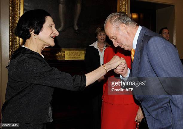 Spain's King Juan Carlos I is greeted by the Governor of the Australian state of New South Wales Professor Marie Bashir at the Government House in...