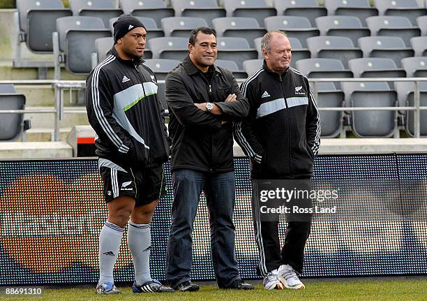 Neemia Tealata former All Black prop Olo Brown and Head coach Graham Henry watch proceedings from the sideline during the All Blacks captains run at...