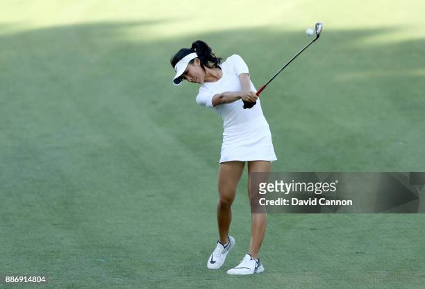 Muni He of China plays her second shot on the par 4, 14th hole during the first round of the 2017 Dubai Ladies Classic on the Majlis Course at The...