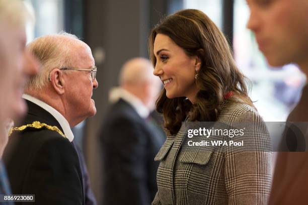 Catherine, Duchess of Cambridge speaks with Councillor Peter Connor , the Mayor of Salford, as she arrives for a 'Stepping Out' session at...