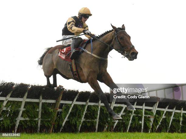 Fairyhouse , Ireland - 3 December 2017; Nichols Canyon, with Paul Townend up, jump the last on their way to a second place finish in the Bar One...