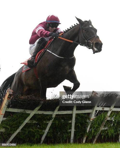 Fairyhouse , Ireland - 3 December 2017; Apple's Jade, with Jack Kennedy up, jump the last on their way to winning the Bar One Racing Hatton's Grace...