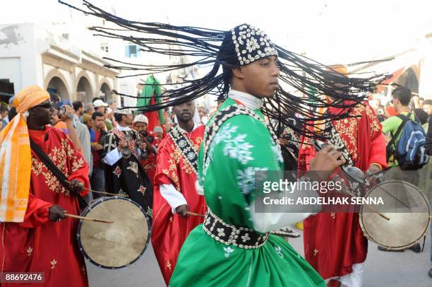 Gnaoua musicians perform during the opening of the 12th Gnaoua Festival and Musics of the World of Essaouira on June 25, 2008. The 12th edition of...