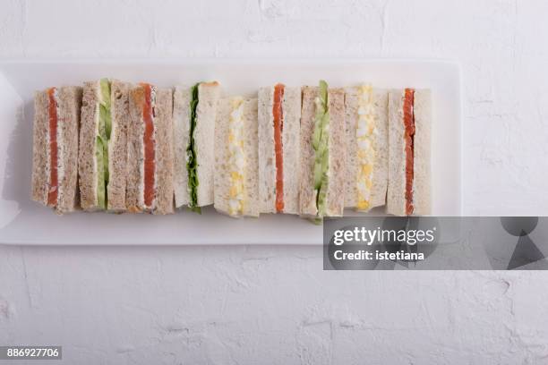 traditional british dishes. english tea sandwiches - teatime english stock-fotos und bilder