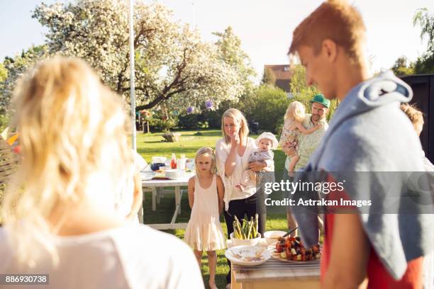 people at garden party - 12 23 months stock pictures, royalty-free photos & images