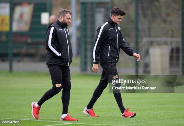 Physiotherapist Hendrik Schreiber and Fabian Schoenheim of 1 FC Union Berlin during the training session on December 6, 2017 in Berlin, Germany.