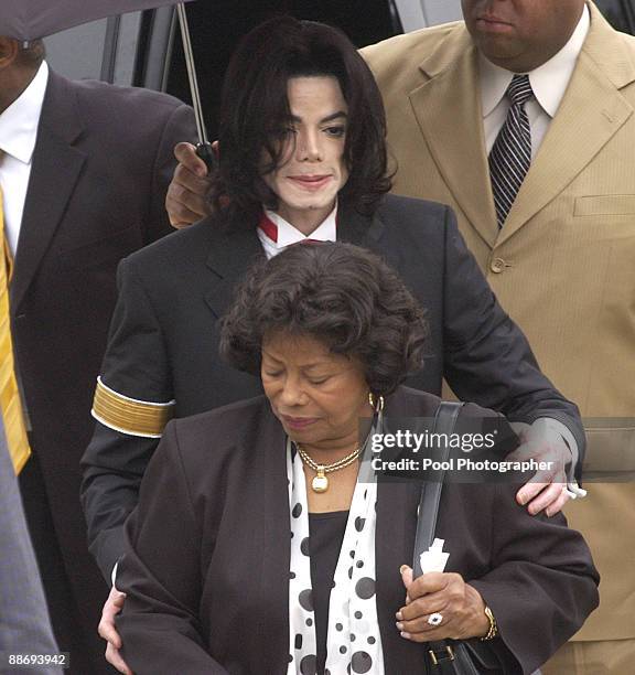 Michael Jackson arrives with his mother, Katherine Jackson, at the Santa Barbara County Courthouse for proceedings in his child molestation trial May...