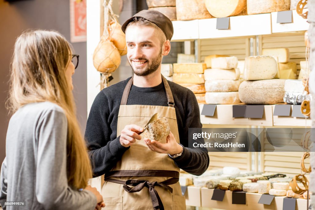 Cheese seller with a customer