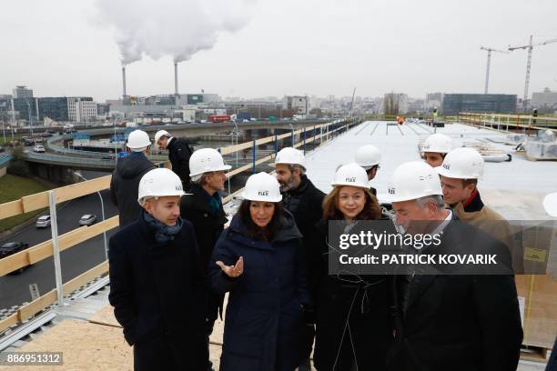 Paris mayor Anne Hidalgo , deputy-mayor in charge of housing Ian Brossat and mayor of Paris' 12th arrondissement Catherine Baratti-Elbaz visit a new...