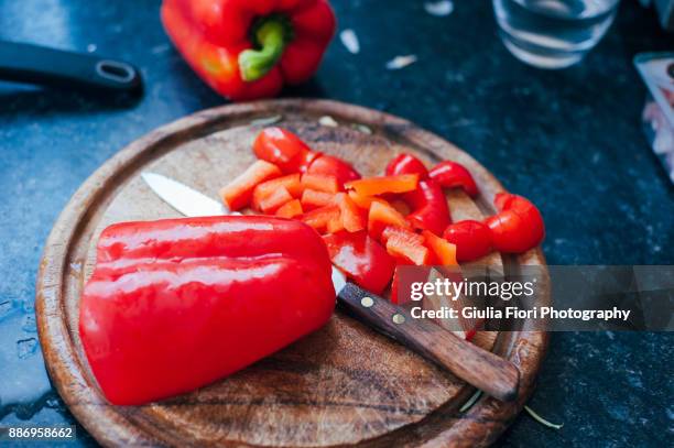 chopped red bell pepper - red pepper stock pictures, royalty-free photos & images