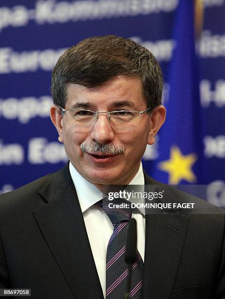 Turkish Foreign Minister Ahmed Davutoglu holds a press conference on June 26 after a meeting with European Commissioner for Enlargement Olli Rehn at...