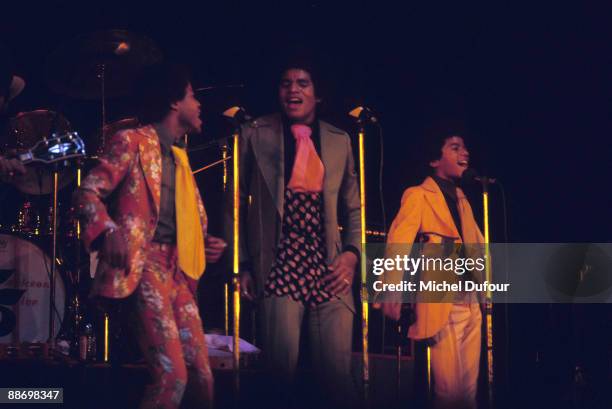 Michael Jackson performs with the Jackson Five in 1972 in Paris, France.