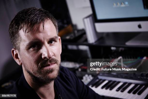 Portrait of English musician and producer David Robertson, better known by his recording name Reset Robot, photographed at his home studio in...