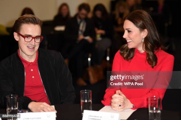 Catherine, Duchess of Cambridge speaks with Tom Fletcher at the Children's Global Media Summit at the Manchester Central Convention on December 6,...