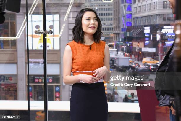 Actress Miranda Cosgrove visits "Extra" at H&M Times Square on December 6, 2017 in New York City.