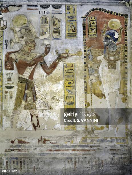Egypt, Thebes - Luxor - Valley of the Kings. Tomb of Ramses III. Annexes to corridor. Mural paintings. Pharaoh offering ritual vases Digital...