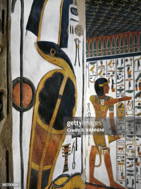 Egypt, Thebes - Luxor - Valley of the Queens. Tomb of Nefertari. Burial chamber. Mural paintings. Uraeus serpent and 'iun-mutef' Horus in the...