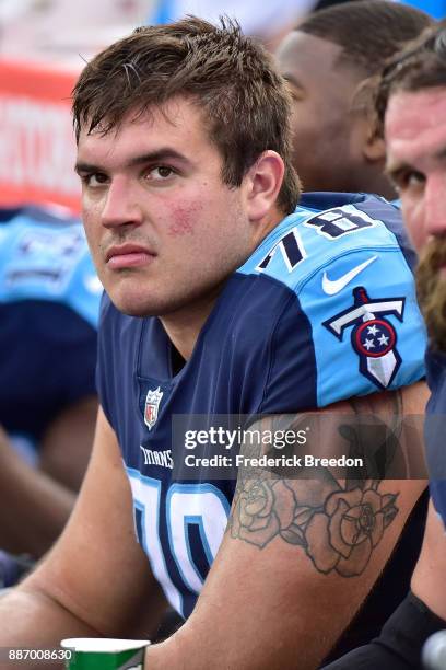 Jack Conklin of the Tennessee Titans watches from the sideline during a game against the Houston Texans at Nissan Stadium on December 3, 2017 in...