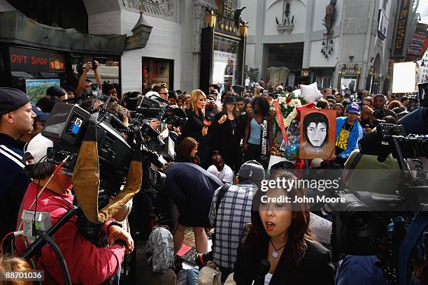 Media and fans of Michael Jackson gather near his star on the Walk of Fame on June 26 a day after his death in Los Angeles, California. Jackson the...
