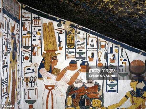 Egypt, Thebes - Luxor - Valley of the Queens. Tomb of Nefertari. Staircase. Mural paintings. Queen offering before Hathor