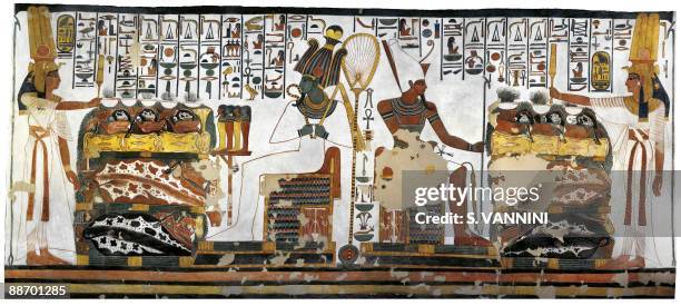 Egypt, Thebes - Luxor - Valley of the Queens. Tomb of Nefertari. Annex to antechamber. Mural paintings. Queen offering before Osiris and Atum Digital...