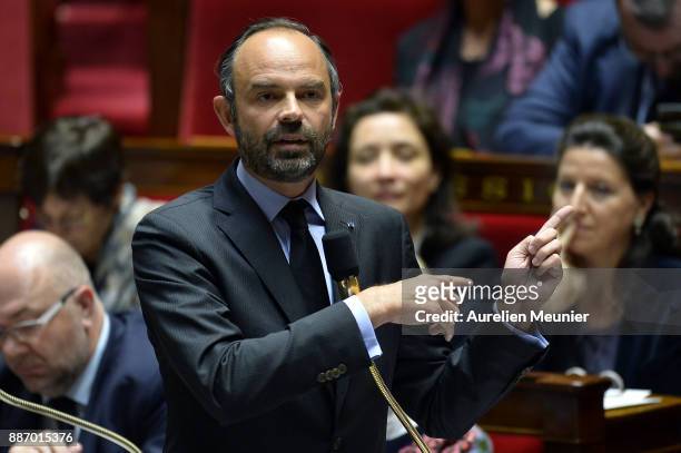 French Prime Minister Edouard Philippe answers deputies questions during the weekly session of questions to the government at Assemblee Nationale on...