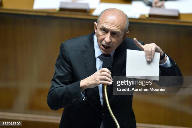 French Minister of Interior Gerard Collomb answers deputies questions during the weekly session of questions to the government at Assemblee Nationale...